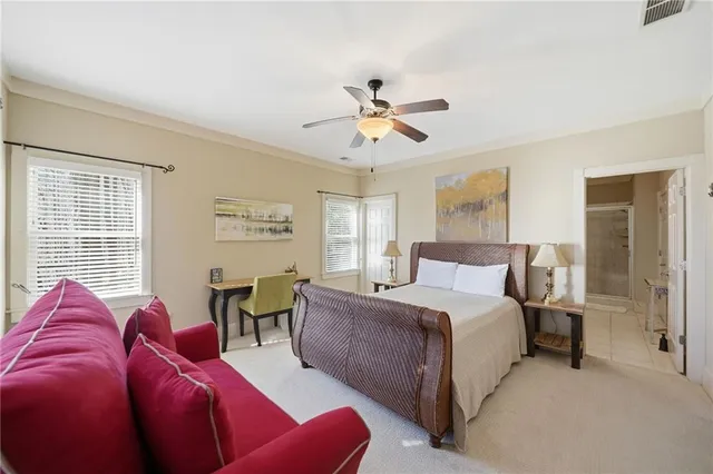 a bathroom with a double vanity sink mirror and toilet