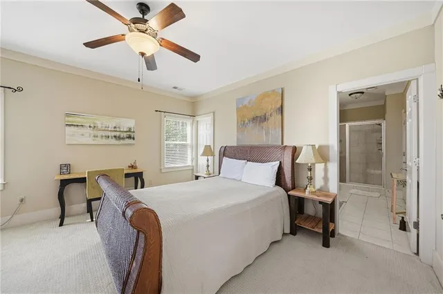 a bathroom with a shower and toilet