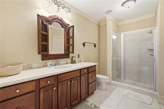 a close view of a utility room with dryer and washer
