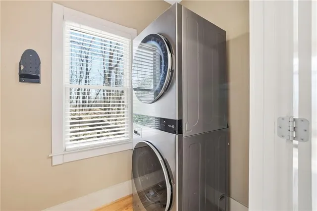 a view of a patio with a table and chairs
