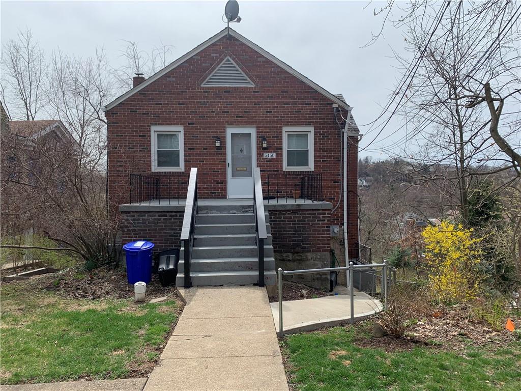 5450 Covode Place, Unit 2 Pittsburgh, PA 15217 - Photo 16 of 16 a front view of a house with garden