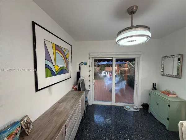 a view of a hallway with workspace