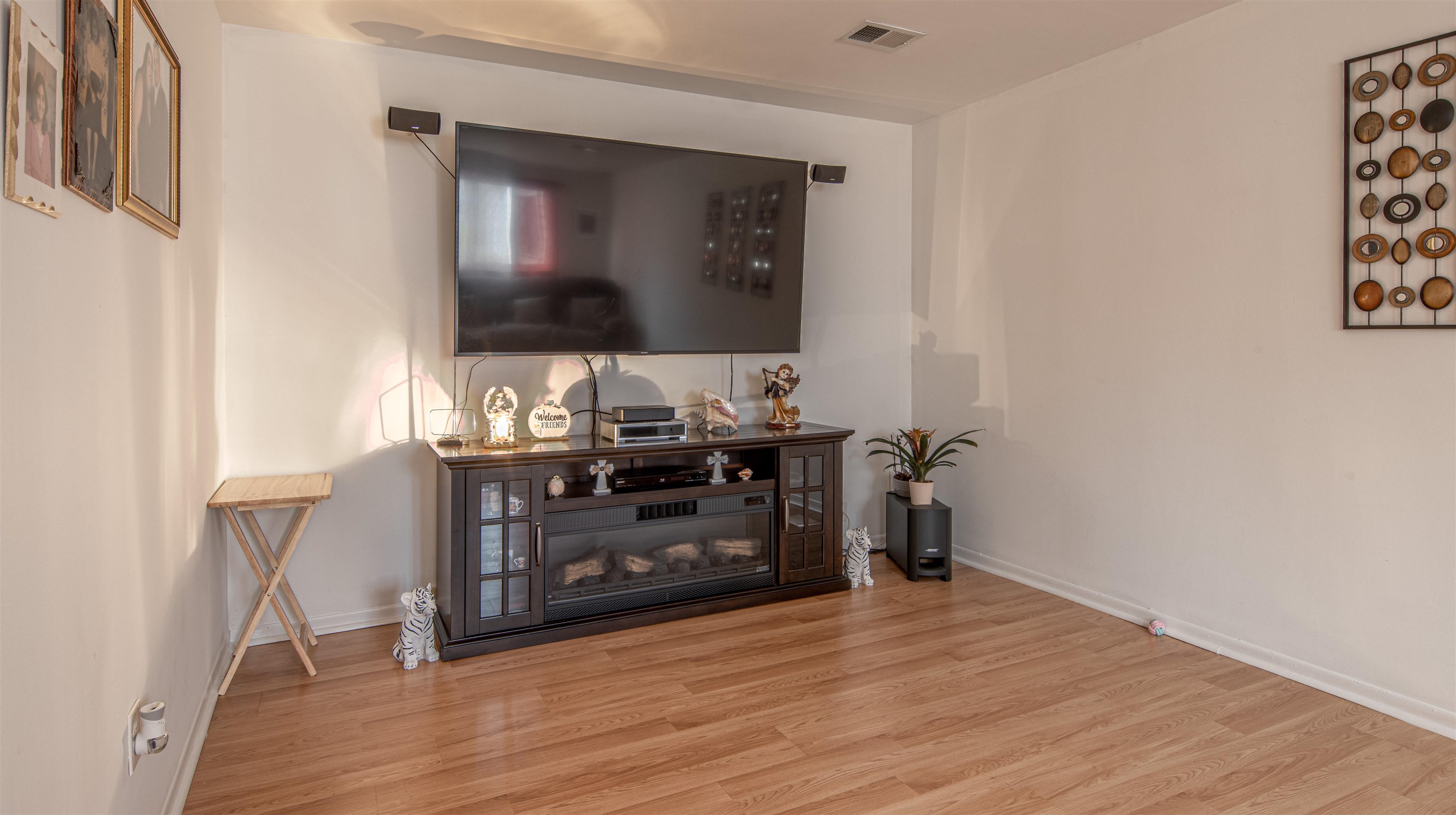 102 Mason Clementon, NJ 08021 - Photo 4 of 12 a room with a wooden floor and a mirror on dresser