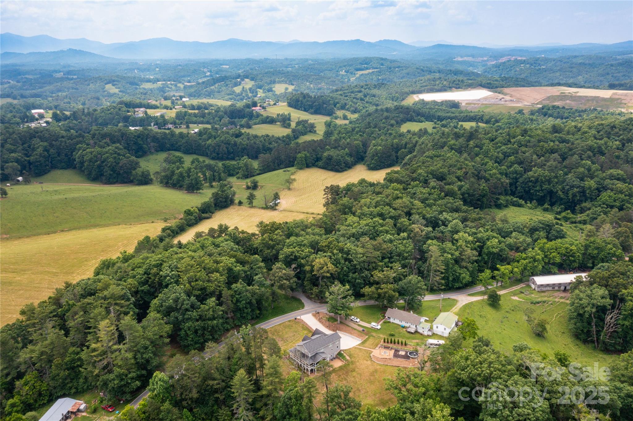 460 Panther Branch Road Alexander, NC 28701 - Photo 6 of 32 a view of lake with mountain