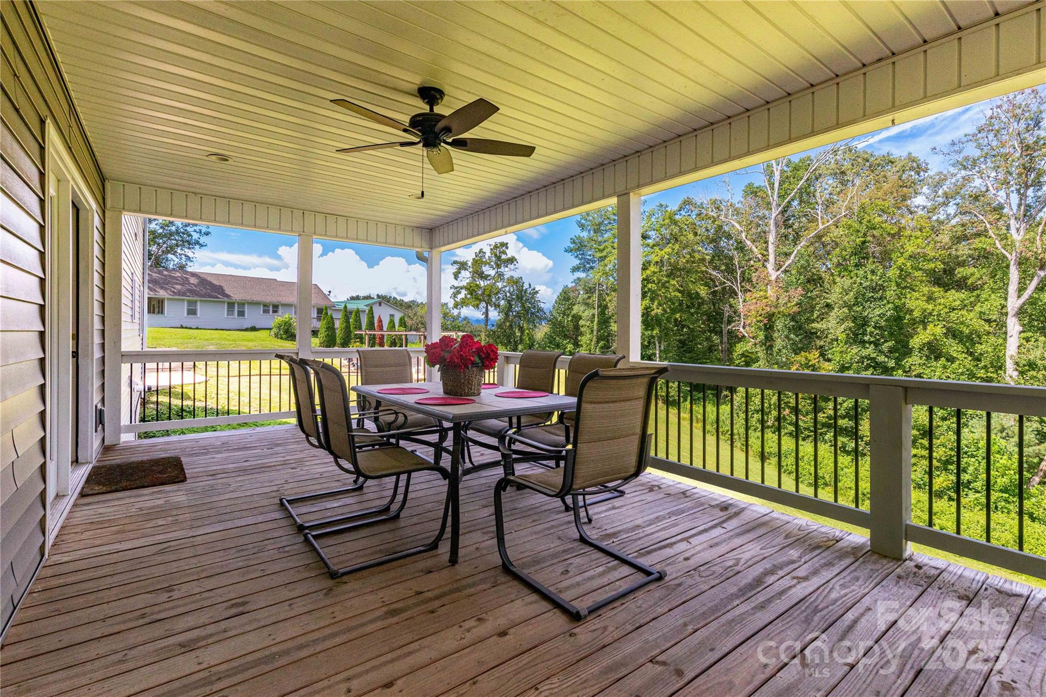 460 Panther Branch Road Alexander, NC 28701 - Photo 9 of 32 a view of a dining room and wooden floor
