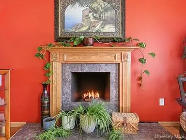 a room with furniture and a fireplace