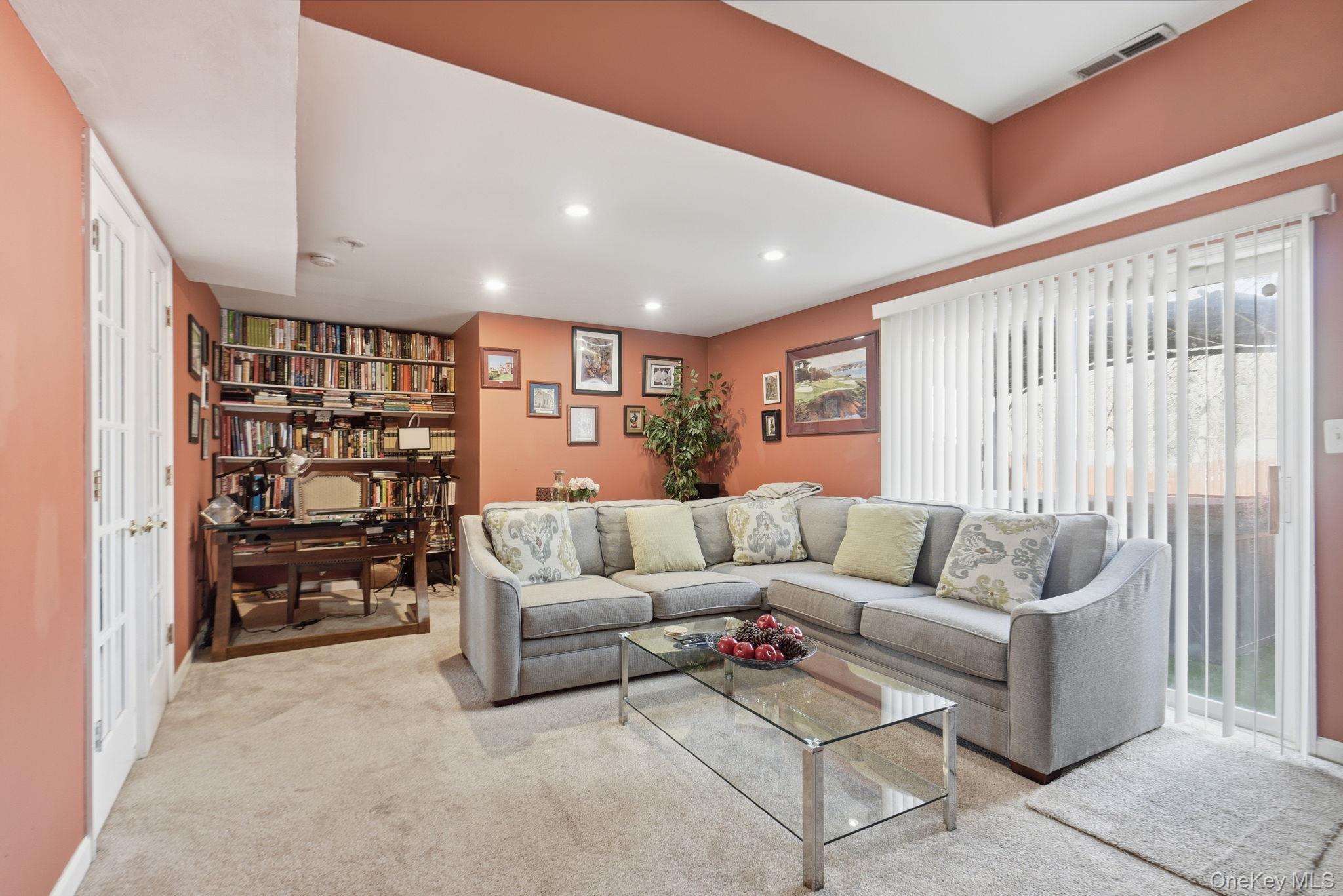25 De Garmo Road Poughkeepsie, NY 12603 - Photo 16 of 50 a living room with furniture and a large window