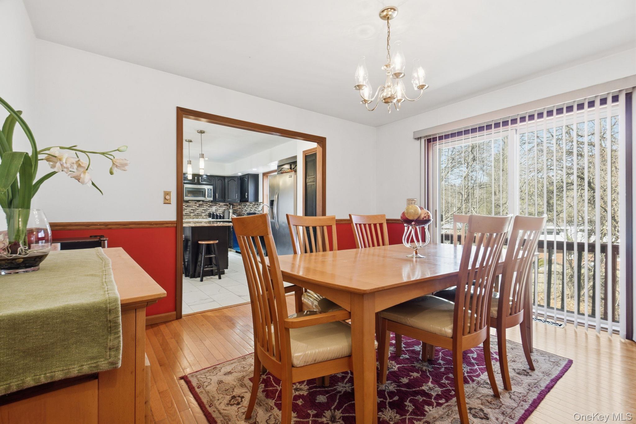 25 De Garmo Road Poughkeepsie, NY 12603 - Photo 18 of 50 a view of a dining room with furniture window and wooden floor