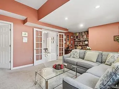 a living room with furniture and a couch