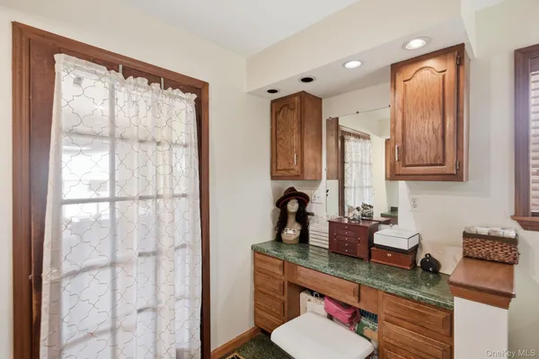 a kitchen with a sink appliances and cabinets