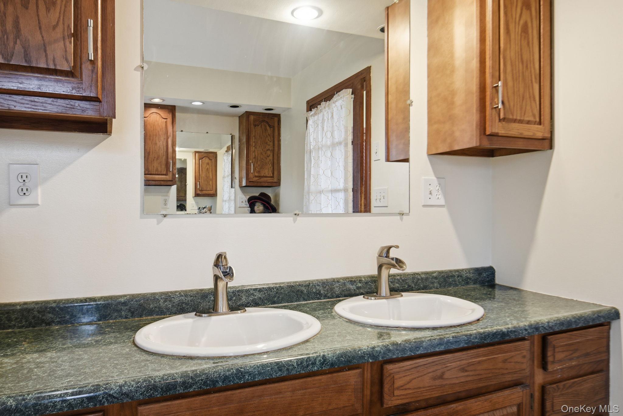 25 De Garmo Road Poughkeepsie, NY 12603 - Photo 30 of 50 a bathroom with sinks granite and a sink
