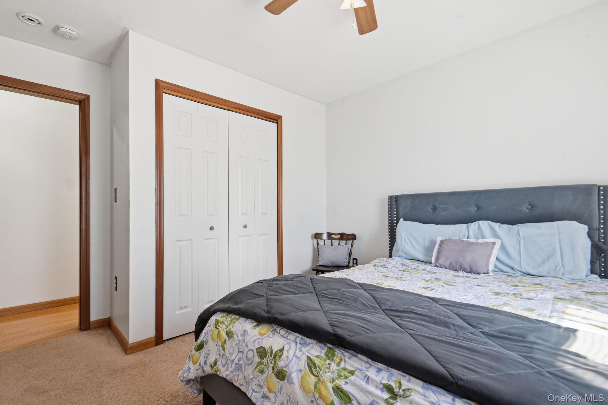 25 De Garmo Road Poughkeepsie, NY 12603 - Photo 32 of 50 a bedroom with a bed and painting on the wall