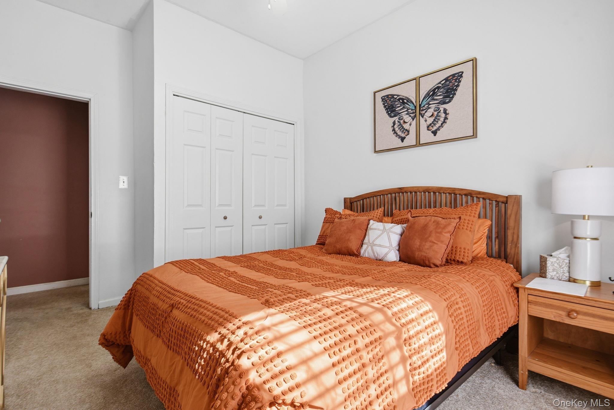 25 De Garmo Road Poughkeepsie, NY 12603 - Photo 40 of 50 a bedroom with a bed and painting on the wall