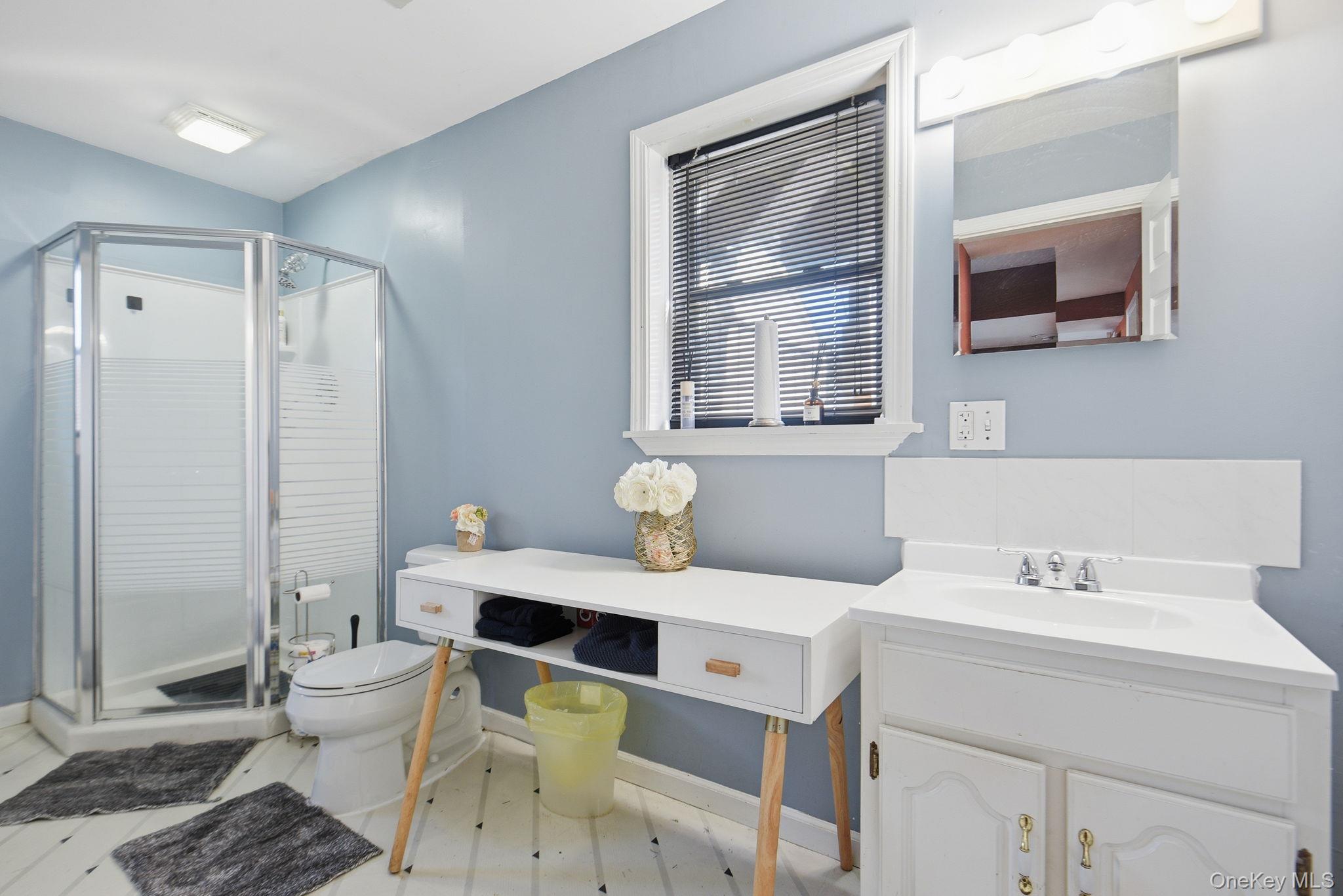 25 De Garmo Road Poughkeepsie, NY 12603 - Photo 41 of 50 a bathroom with a sink toilet and shower