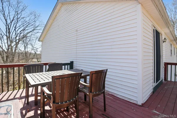 a view of a patio on wooden deck