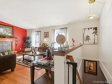 a view of a livingroom with furniture and a living room