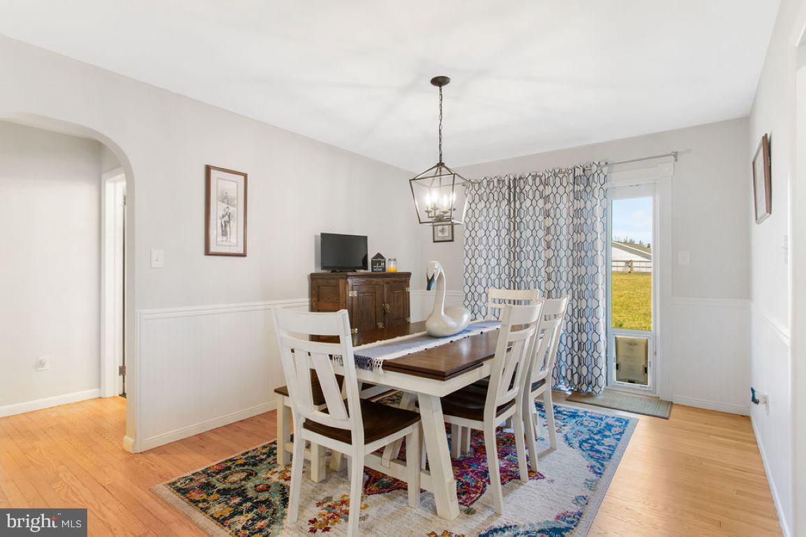 2970 Baltimore Pike Hanover, PA 17331 - Photo 9 of 30 a view of a dining room with furniture window and wooden floor