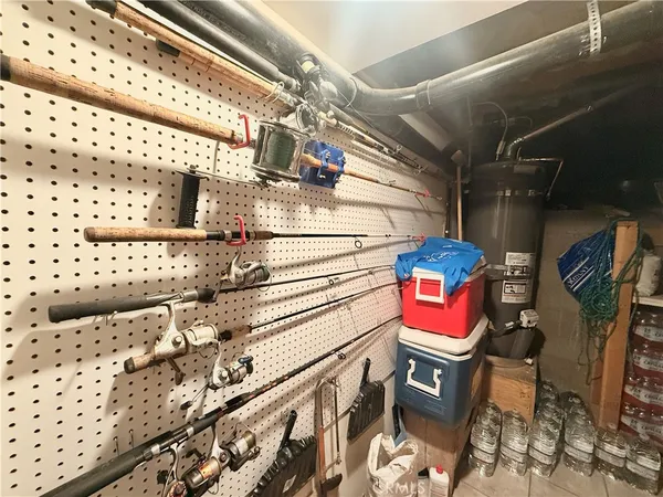 a store room with chairs and washer