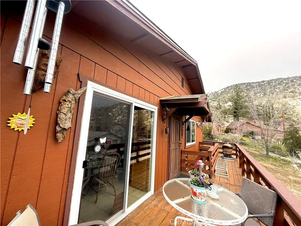 a house view with a outdoor seating space