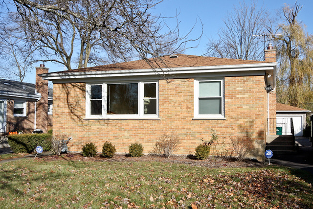557 Sumac Road Highland Park, IL 60035 - Photo 1 of 20 a view of a house with a yard