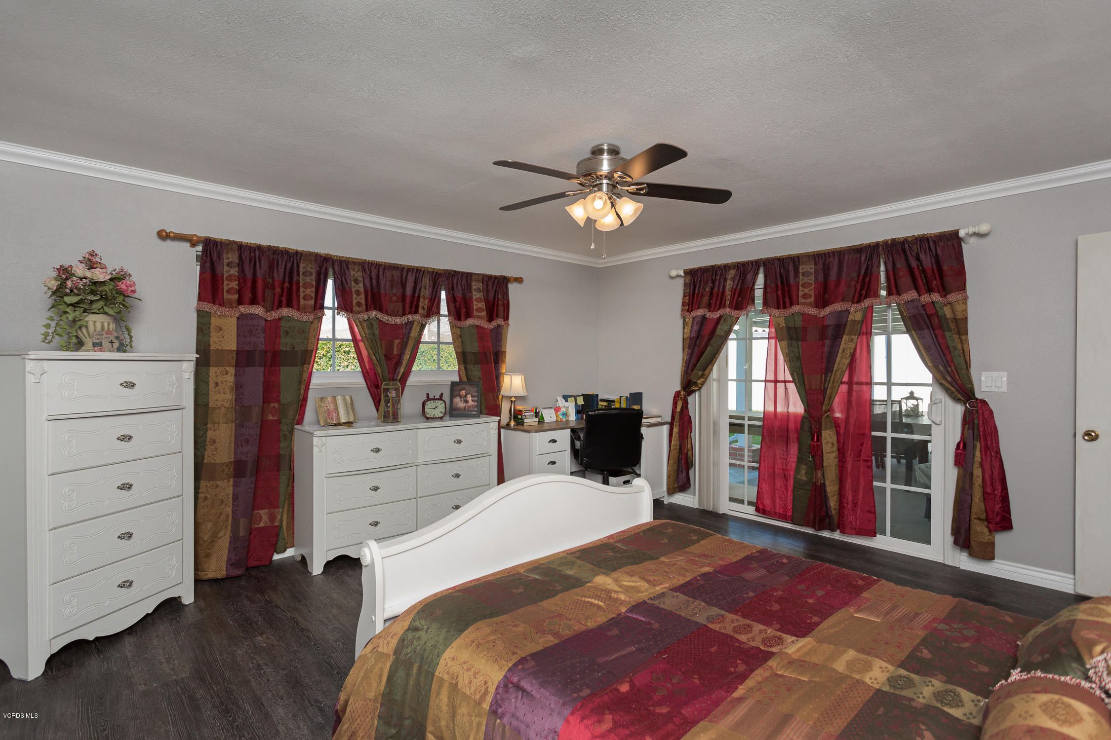 6295 Caroline Avenue Simi Valley, CA 93063 - Photo 15 of 27 a bedroom with a large bed and a window