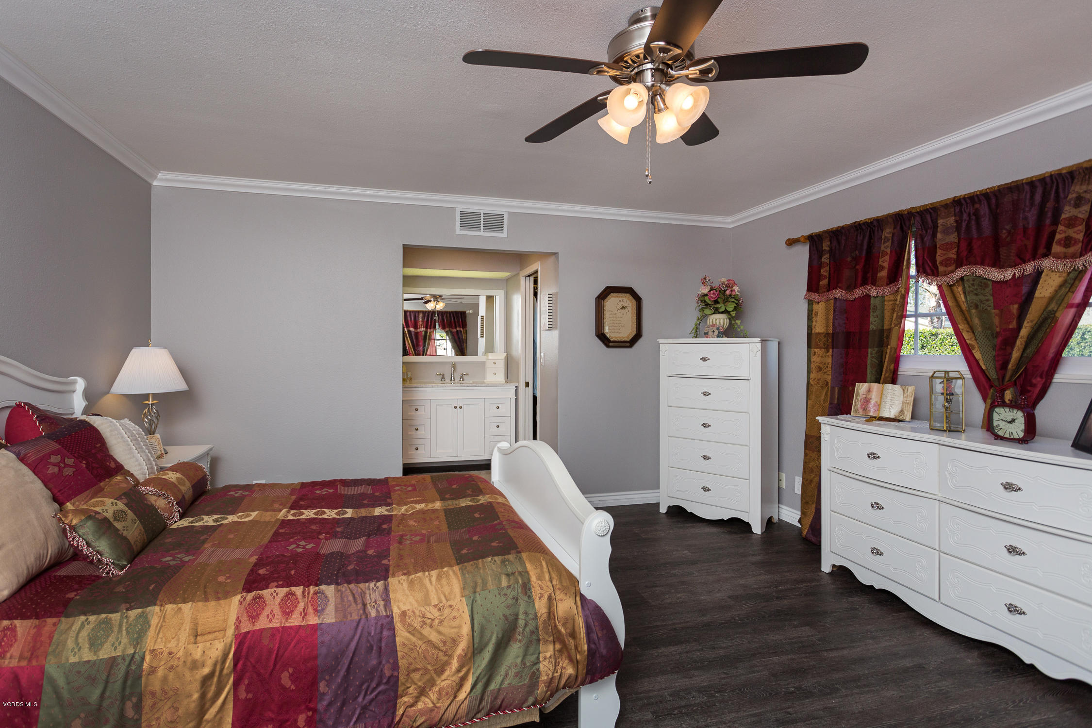 6295 Caroline Avenue Simi Valley, CA 93063 - Photo 16 of 27 a bedroom with a bed and a dresser