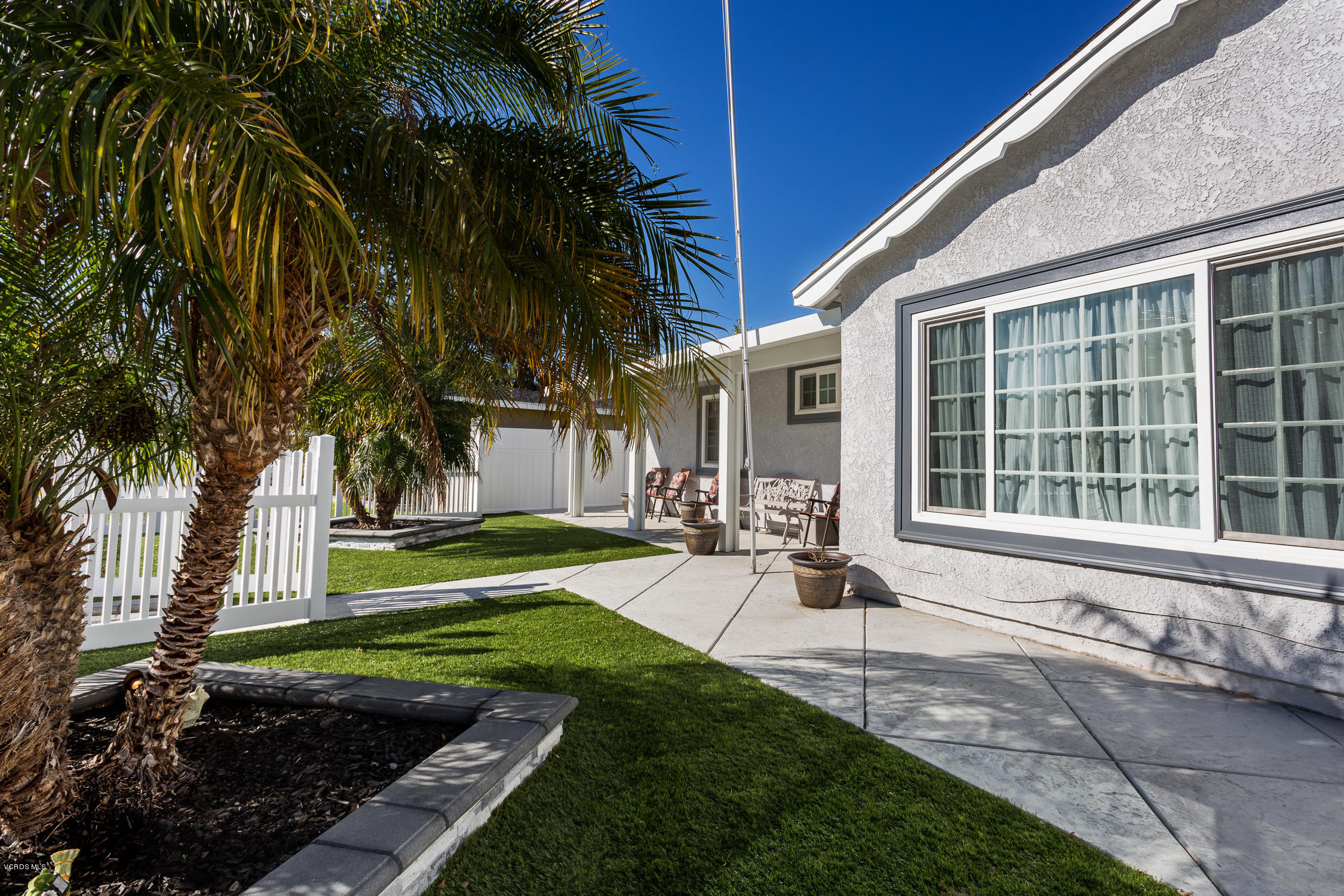 6295 Caroline Avenue Simi Valley, CA 93063 - Photo 3 of 27 a view of a house with backyard and sitting area