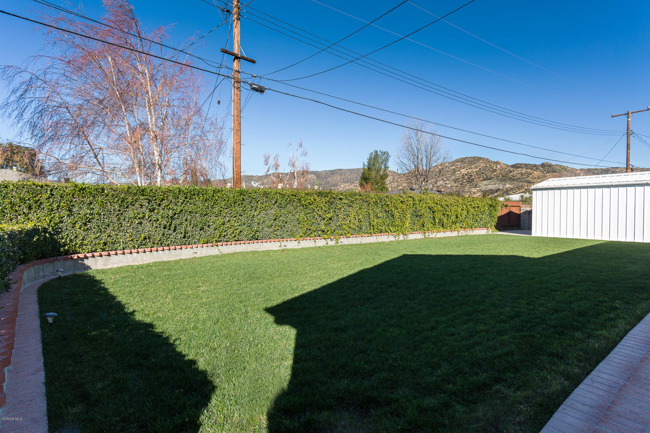 6295 Caroline Avenue Simi Valley, CA 93063 - Photo 25 of 27 a view of a golf course with a garden