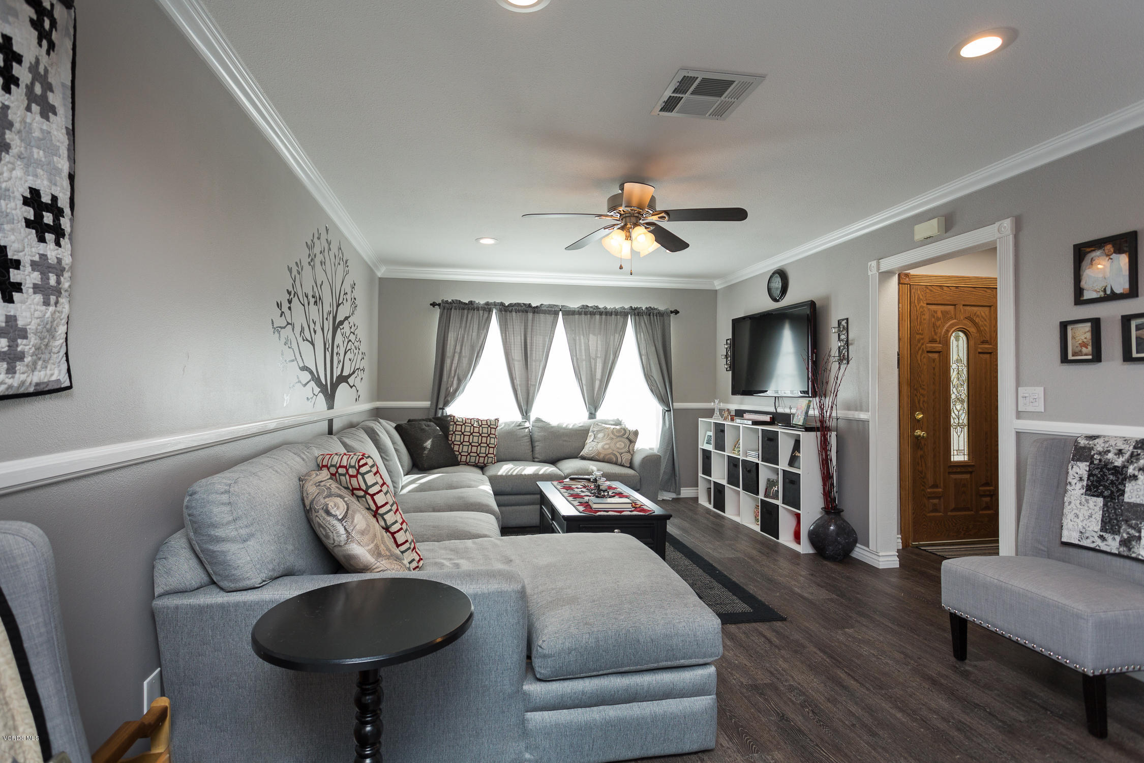 6295 Caroline Avenue Simi Valley, CA 93063 - Photo 7 of 27 a living room with furniture and a wooden floor