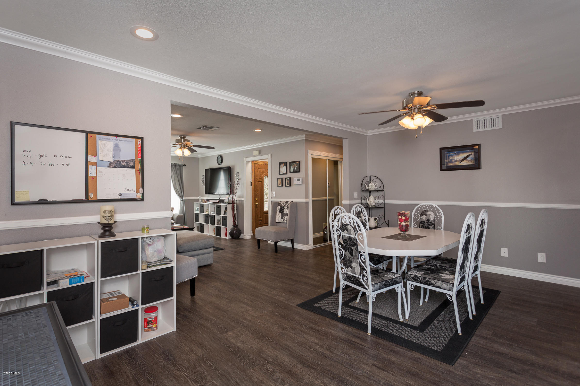 6295 Caroline Avenue Simi Valley, CA 93063 - Photo 9 of 27 a view of a dining room with furniture and wooden floor