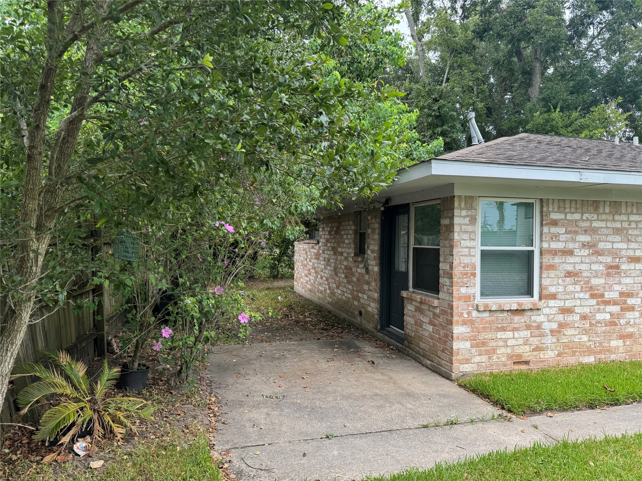 604 Wilson Road, Unit 8 Humble, TX 77338 - Photo 2 of 25 Side Patio