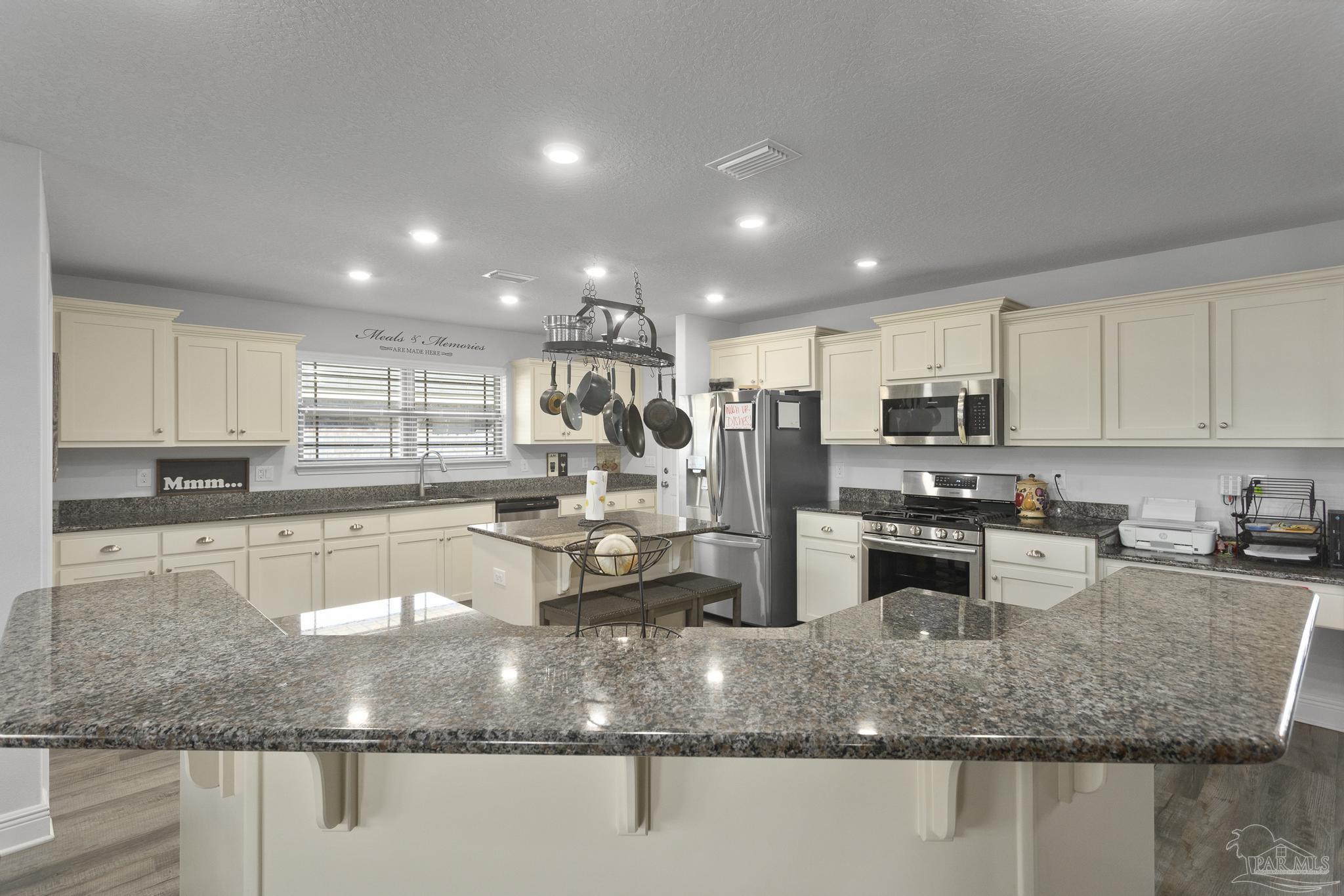 4847 Legacy Street Milton, FL 32570 - Photo 12 of 31 Granite, Stainless Appliances