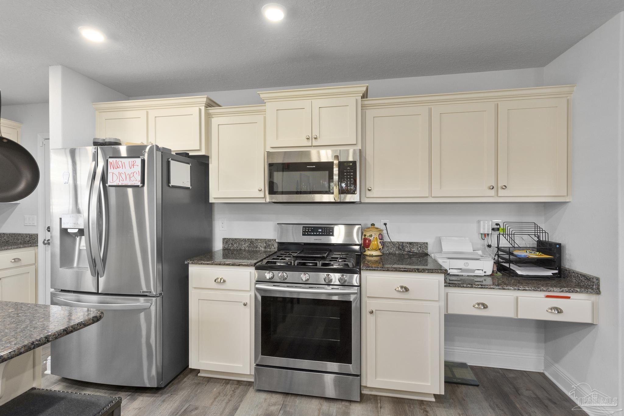 4847 Legacy Street Milton, FL 32570 - Photo 14 of 31 Gas Stove, Desk area