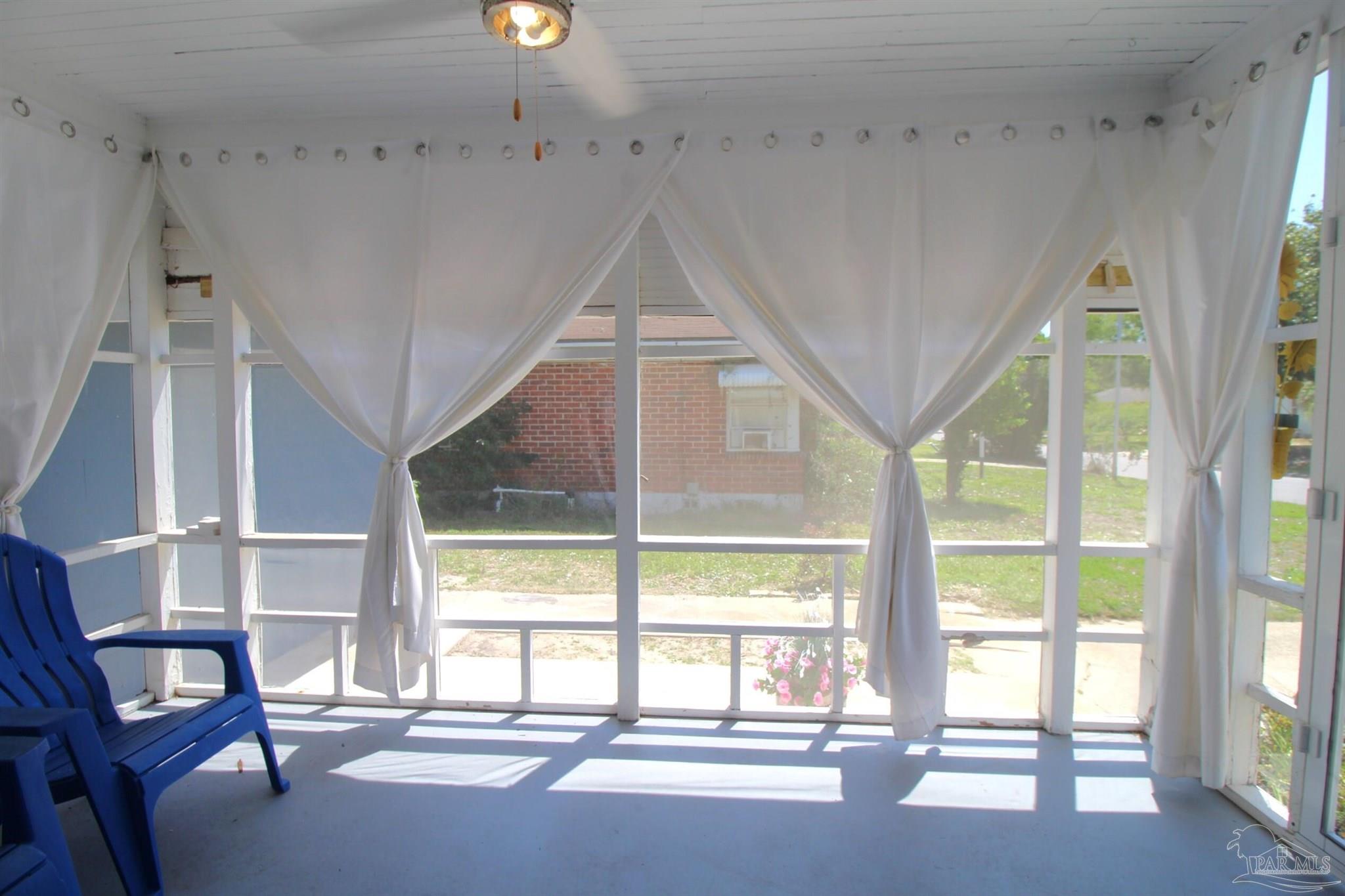 315 Flannan Road Pensacola, FL 32507 - Photo 4 of 17 a view of an empty room with a window