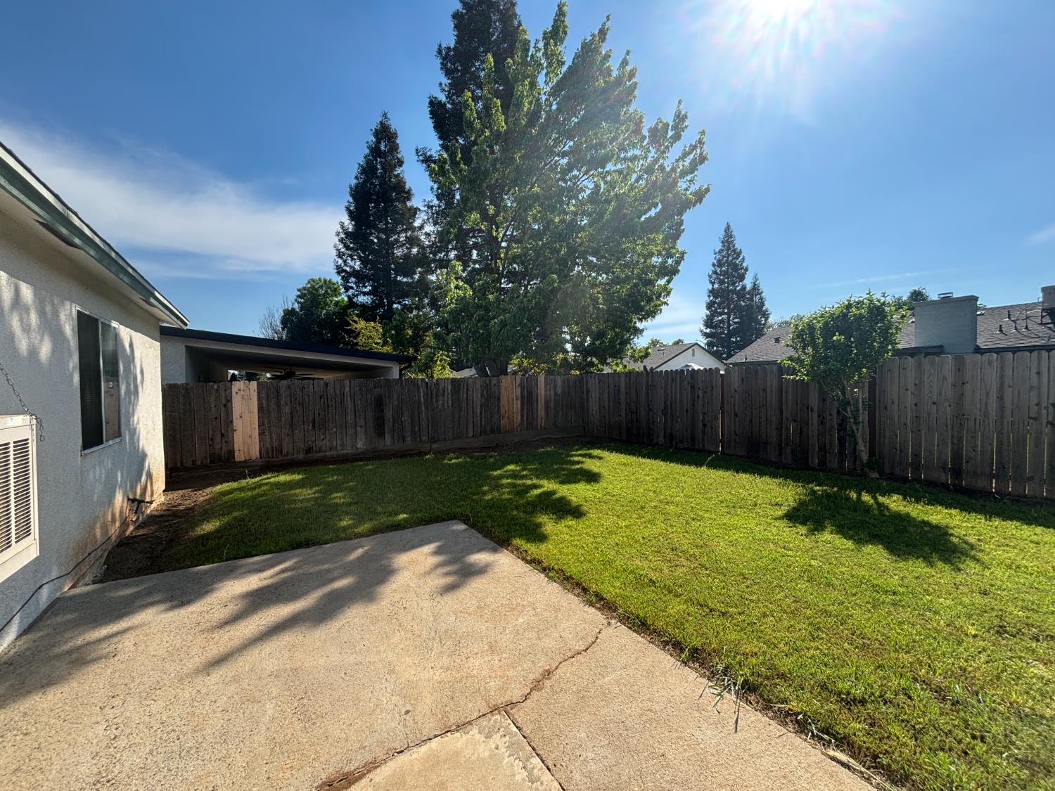 813 Morton Avenue Sanger, CA 93657 - Photo 18 of 19 a view of a backyard with wooden fence