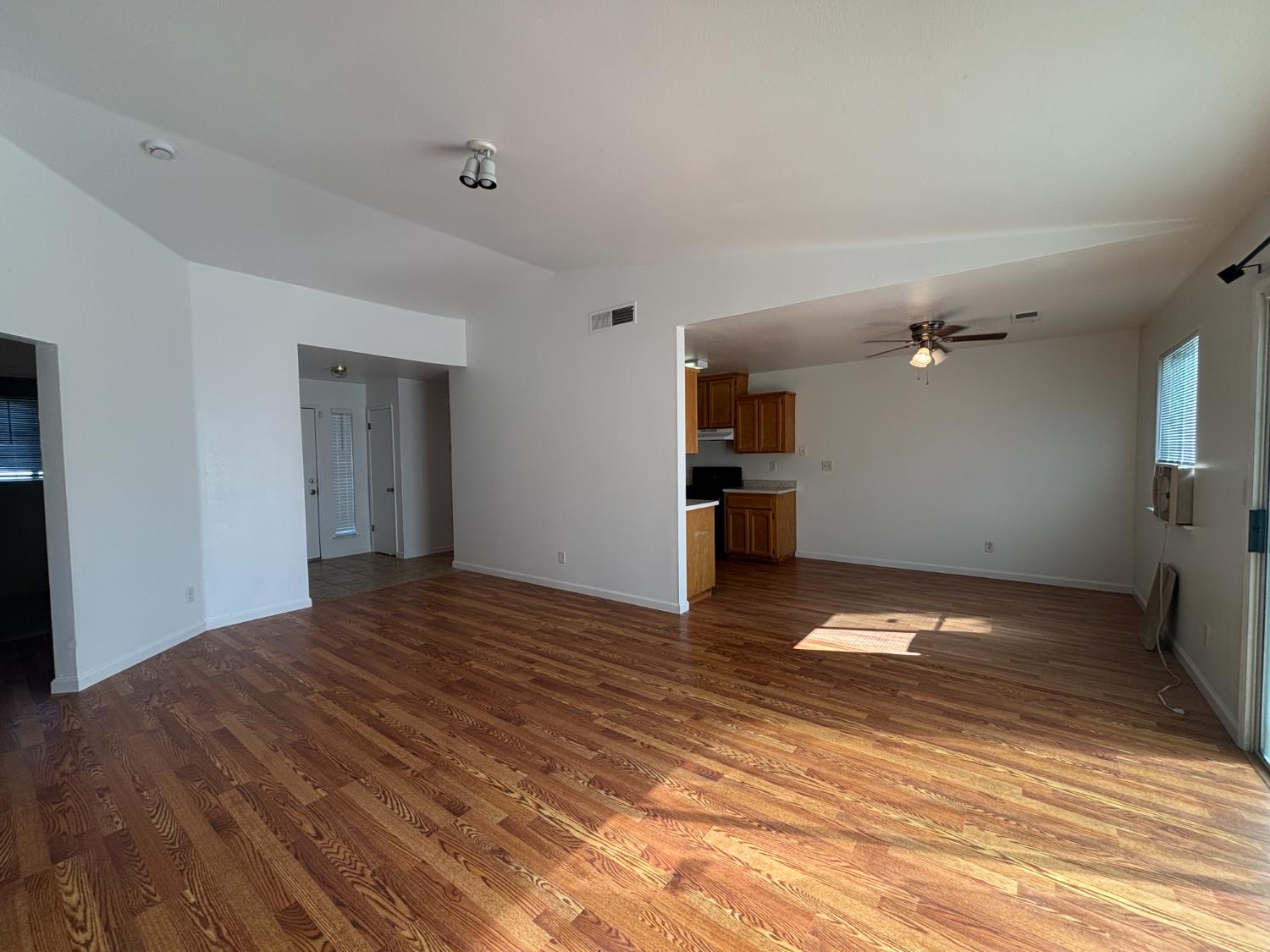 813 Morton Avenue Sanger, CA 93657 - Photo 3 of 19 a view of empty room with wooden floor