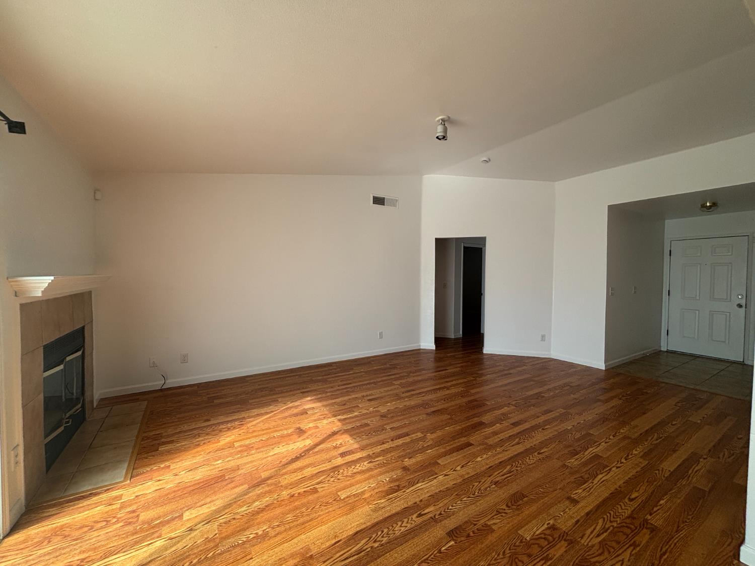 813 Morton Avenue Sanger, CA 93657 - Photo 4 of 19 a view of an empty room with closet and a fireplace