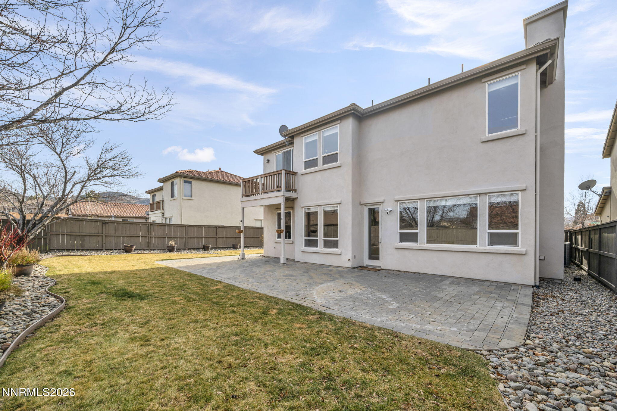 475 Parade Drive Reno, NV 89521 - Photo 42 of 113 a front view of a house with a yard and garage