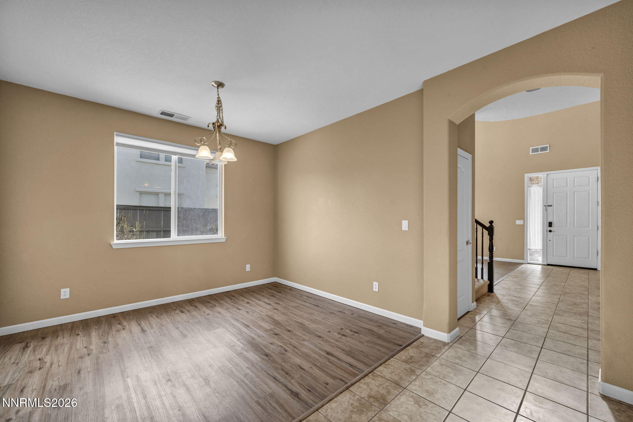 475 Parade Drive Reno, NV 89521 - Photo 56 of 113 wooden floor in an empty room with a window