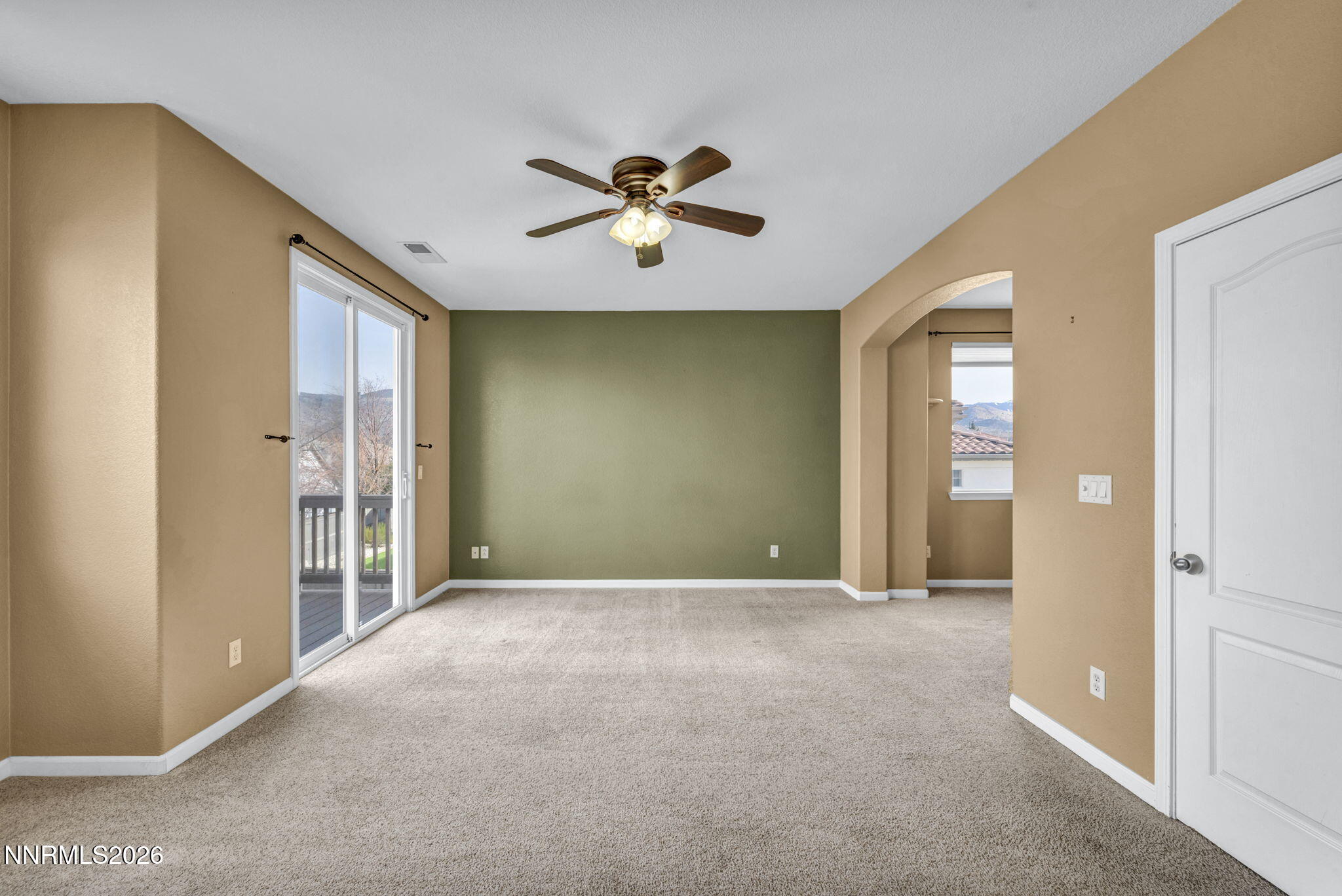 475 Parade Drive Reno, NV 89521 - Photo 86 of 113 a view of a livingroom with a ceiling fan & entryway