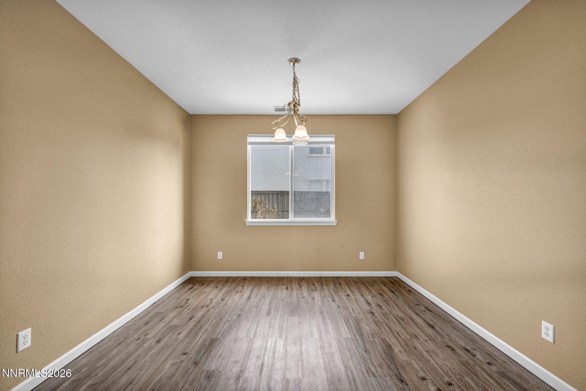 475 Parade Drive Reno, NV 89521 - Photo 98 of 113 a view of a room with wooden floor cabinets and a window