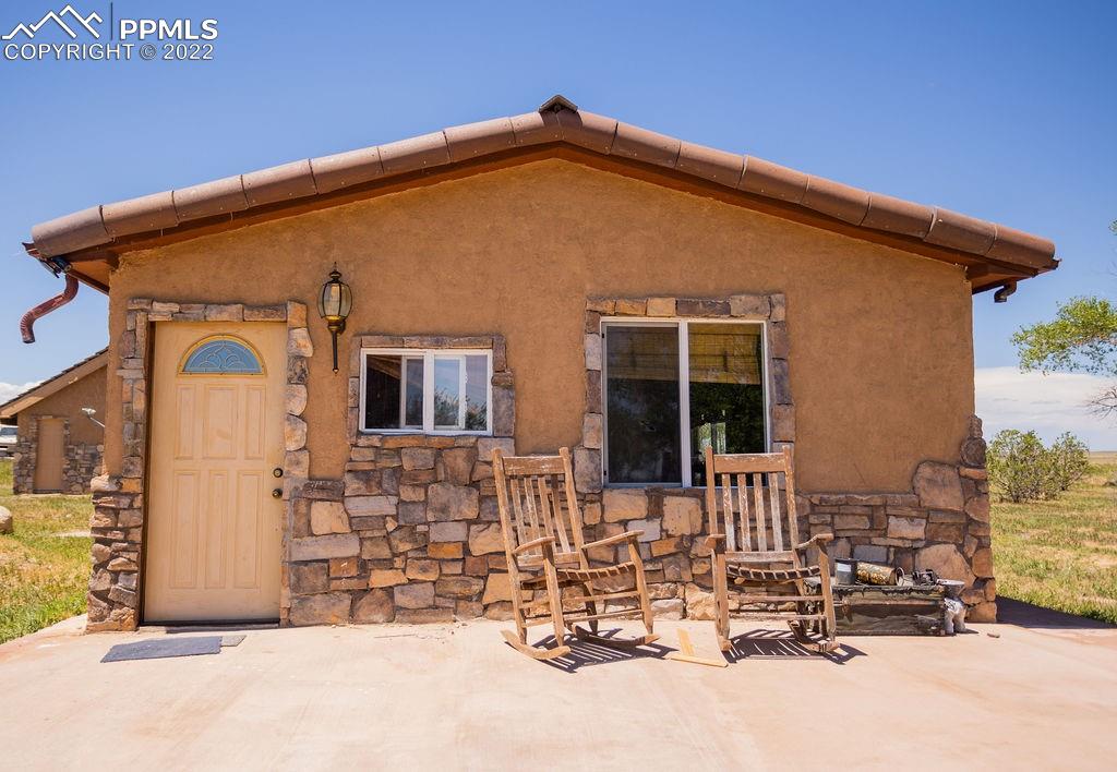 30915 Washington Road Calhan, CO 80808 - Photo 19 of 29 a view of house with outdoor space