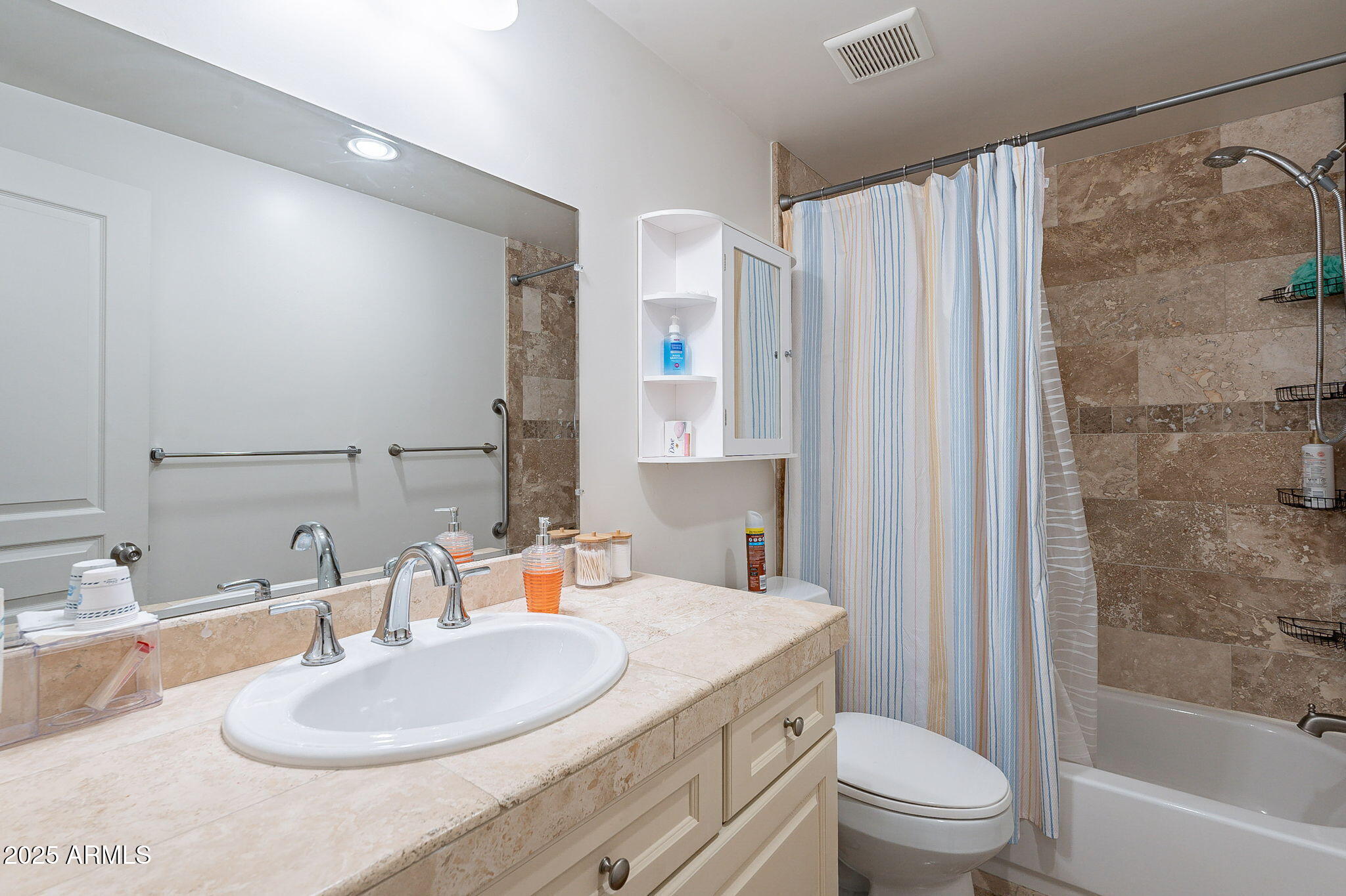 15606 South Gilbert Road, Unit 63 Chandler, AZ 85225 - Photo 16 of 21 a bathroom with a sink toilet and shower