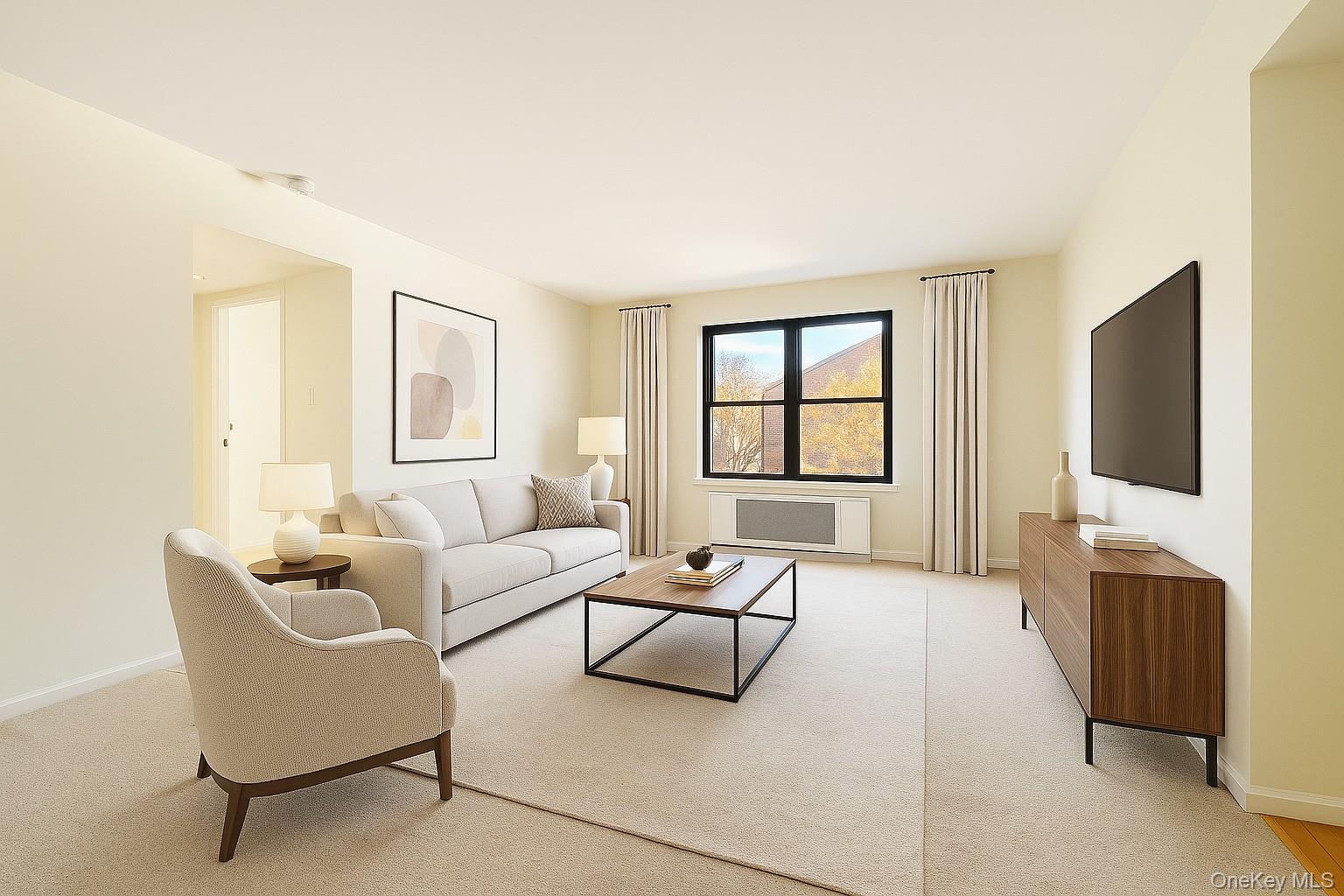 7 Terrace, Unit 3H Great Neck, NY 11021 - Photo 3 of 37 a living room with furniture and a flat screen tv