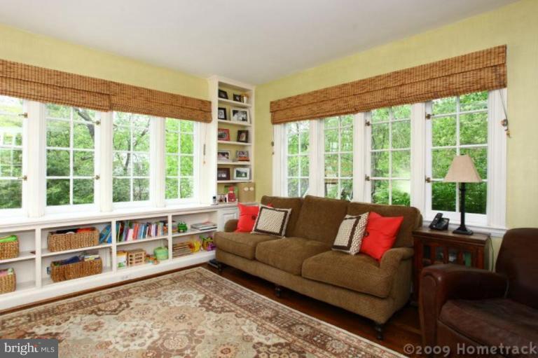 213 Tunbridge Road Baltimore, MD 21212 - Photo 7 of 24 a living room with furniture and a large window