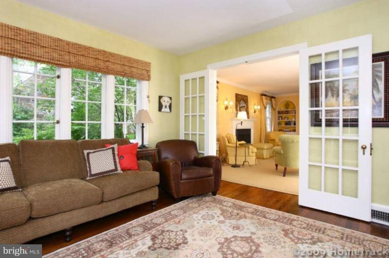 213 Tunbridge Road Baltimore, MD 21212 - Photo 8 of 24 a living room with furniture and a large window