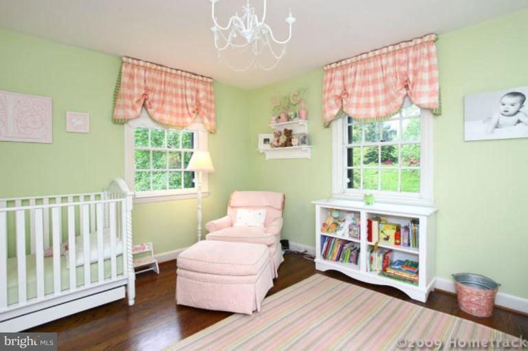 213 Tunbridge Road Baltimore, MD 21212 - Photo 10 of 24 a bedroom with furniture a bed and a window