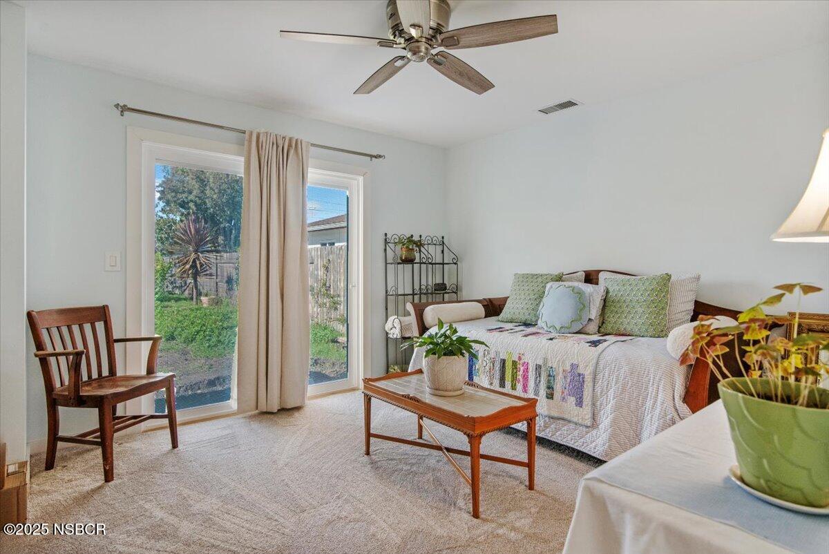 335 South F Street Lompoc, CA 93436 - Photo 23 of 44 a living room with furniture and a window