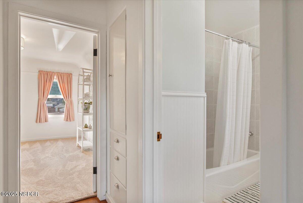 335 South F Street Lompoc, CA 93436 - Photo 27 of 44 a view of a bathroom with a shower