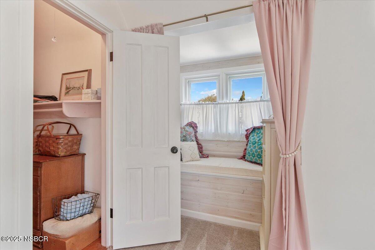 335 South F Street Lompoc, CA 93436 - Photo 31 of 44 a bathroom with a sink and a mirror